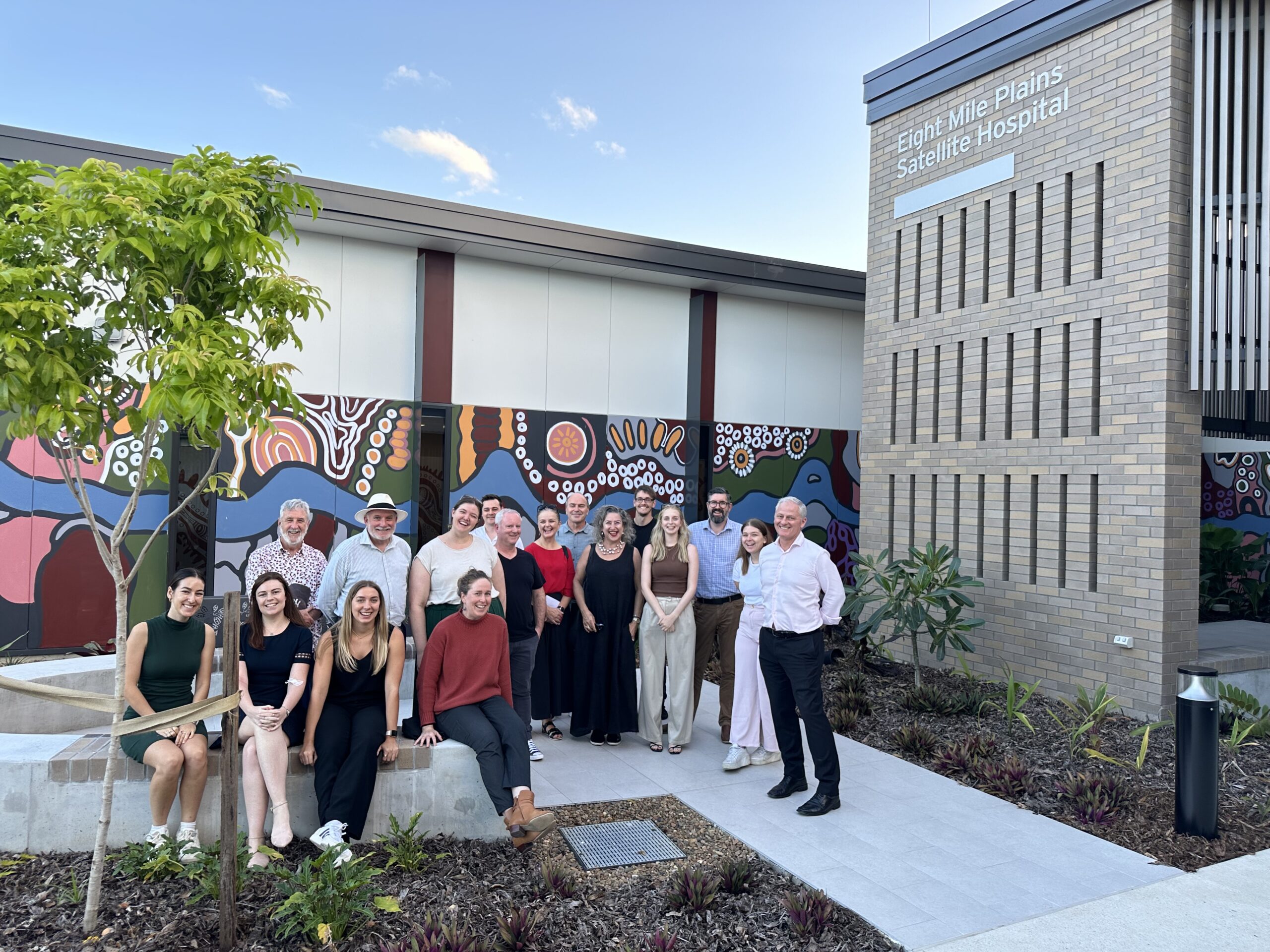 Fulton Trotter Architects team out the front of the new Eight Mile Plains Satellite Hospital.